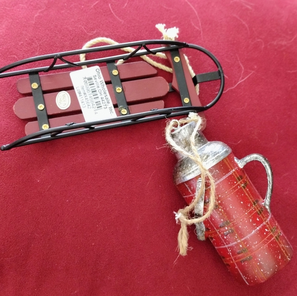 (2) Ornaments red rocket sled and milk can